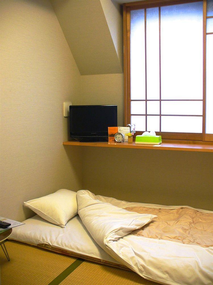 Family Inn Saiko Tokio Buitenkant foto