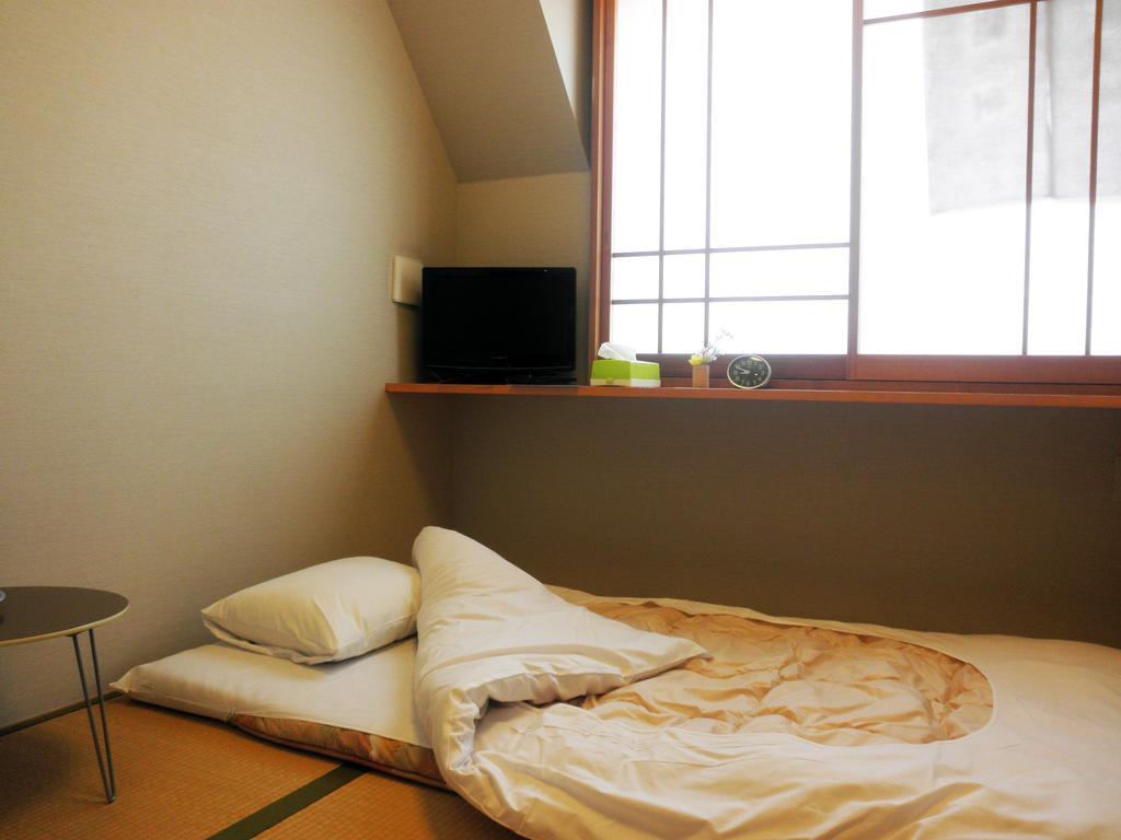 Family Inn Saiko Tokio Buitenkant foto