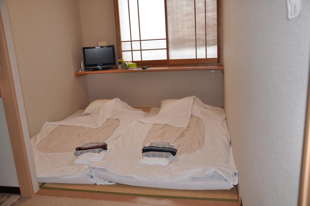 Family Inn Saiko Tokio Buitenkant foto